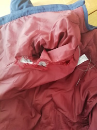 image de doublure de manteau déchirée
